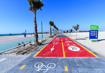 Electric scooter rules in UAE – rider using electric scooter legally with safety helmet