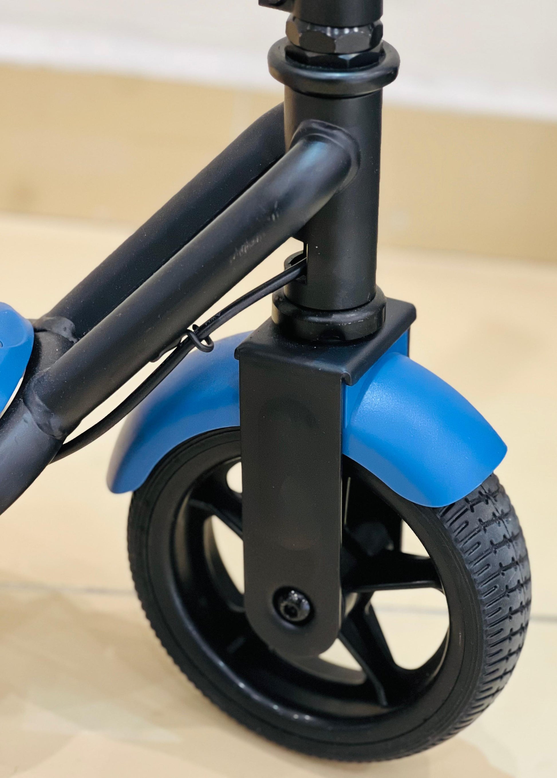 Kid making controlled spins on a electric drifting scooter.