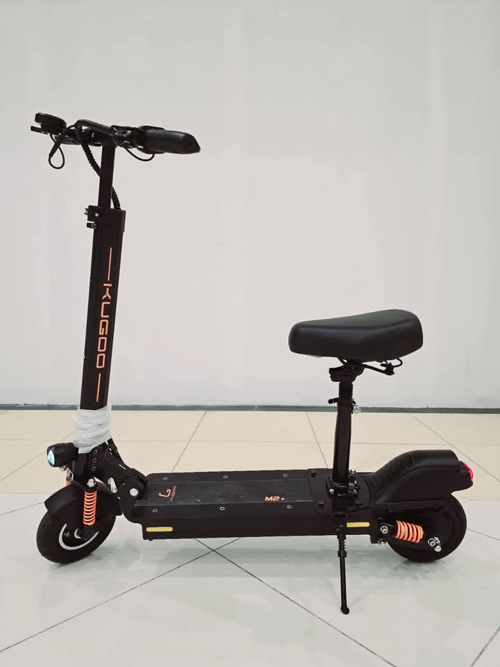 Kugoo D1 M2+ electric scooter, electric scotty, electric bicycle, escooter, perfect for adults with strong motor, durable frame, and comfortable city commuting.