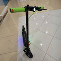 Kugoo Pro 4 electric scooter in green accents offering stable and efficient rides.