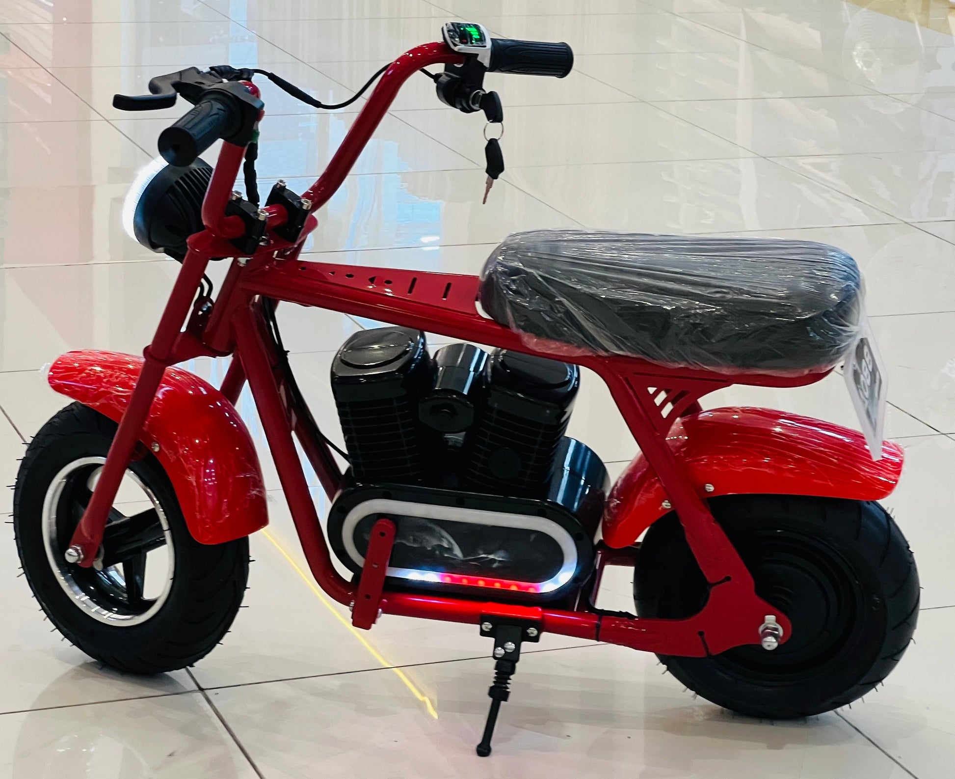 Young rider enjoying a smooth, powered ride on a compact mini electric bike.
